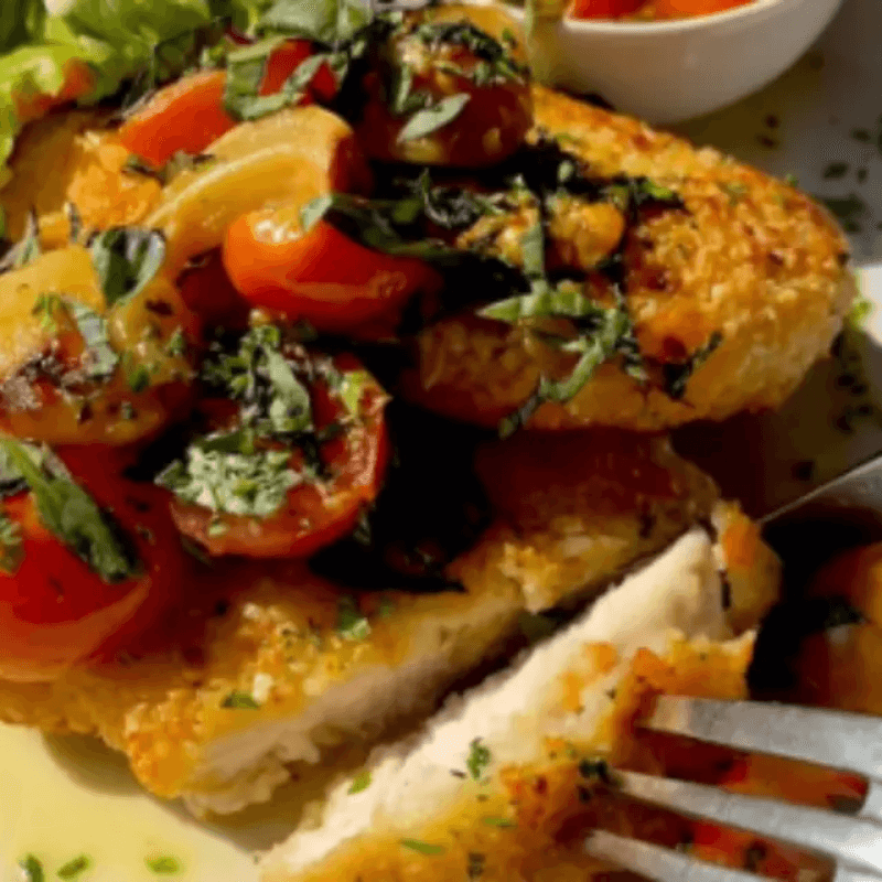 Almond Crusted Chicken with Roasted Cherry Tomatoes and Garlic (634 kcal)